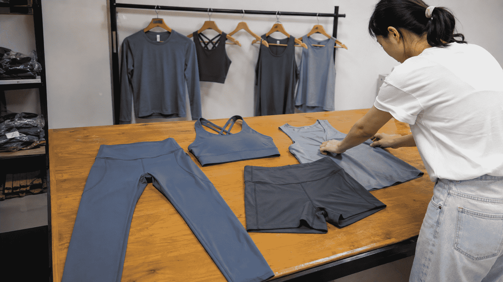 Multiple MOVEVOX activewear SKUs organized by style color and size for B2B production