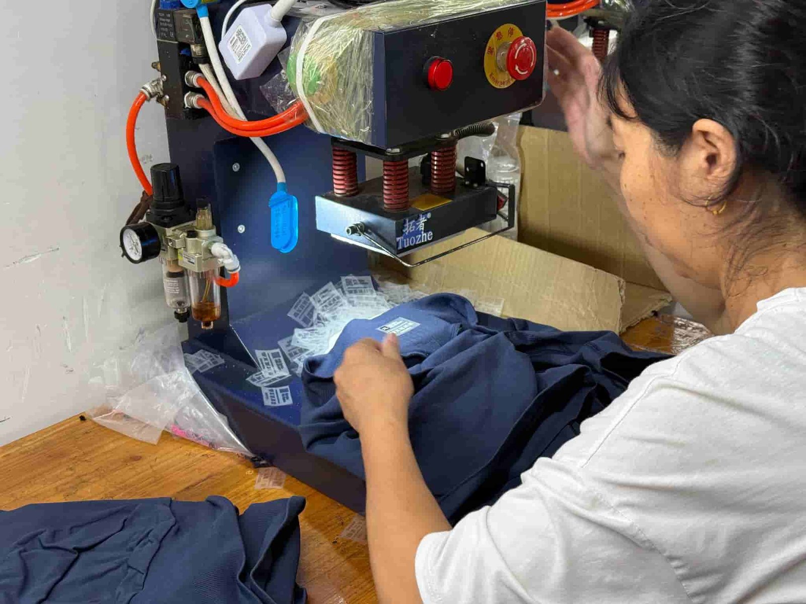 Printed or heat transfer logo color trial positioned on knitted sports T-shirt fabric