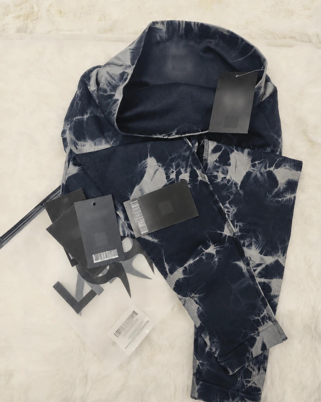 MOVEVOX private label activewear with garment branding labels and packaging