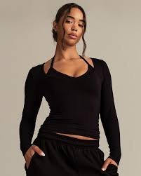Custom fitted sports tank top with neckline armhole and seam construction visible