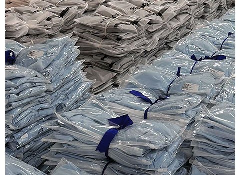 MOVEVOX packing and warehouse area with finished activewear cartons prepared for shipment