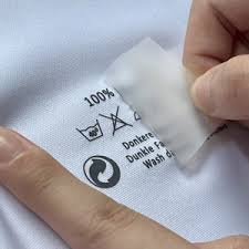 Tagless heat transfer interior neck label on athletic top with smooth skin touch