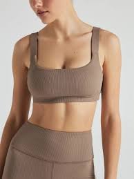 MOVEVOX ribbed seamless sports bra showing an integrated knitted lower-band structure
