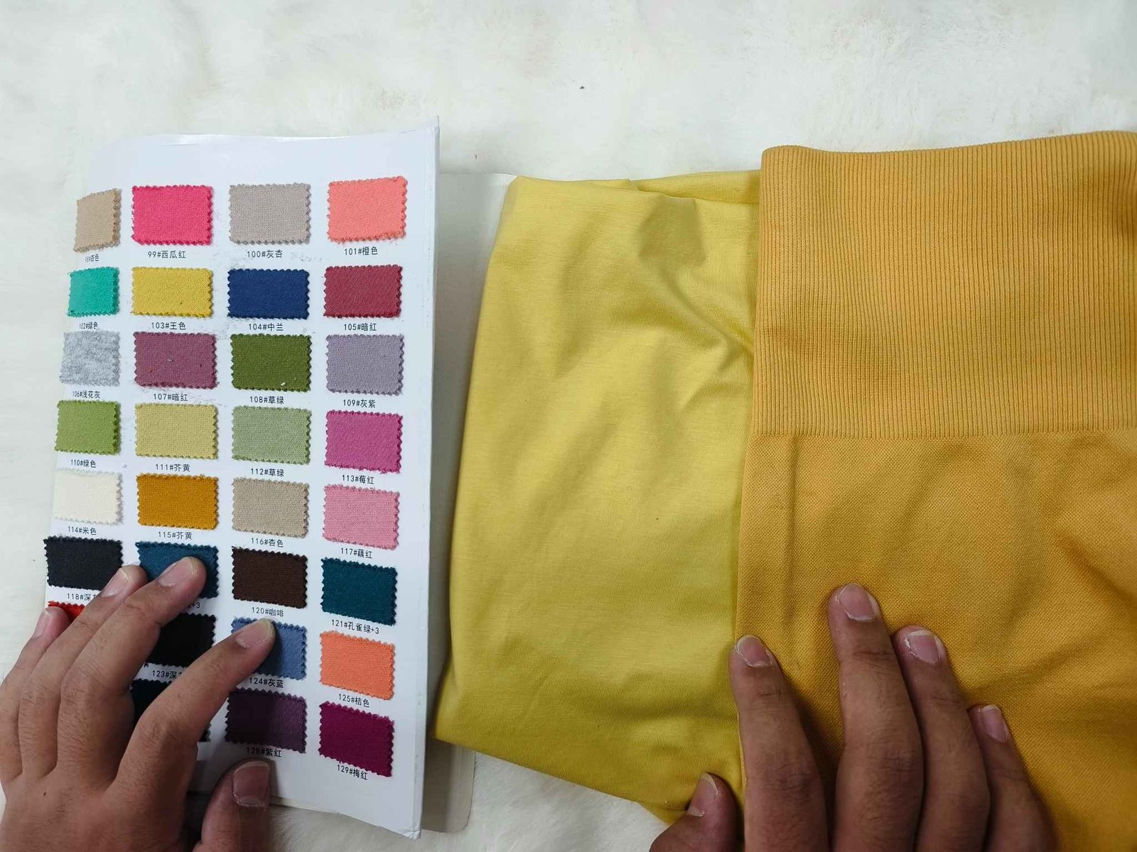 MOVEVOX custom activewear color development with Pantone references fabric swatches yarn and garments