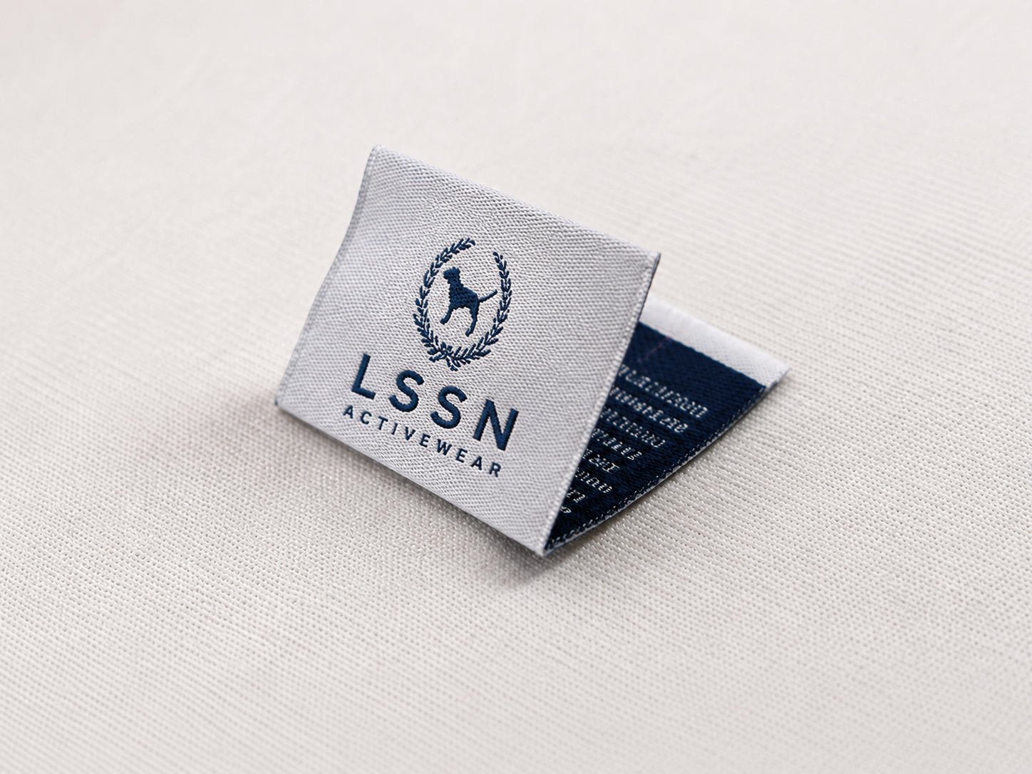 Supporting woven brand label on activewear
