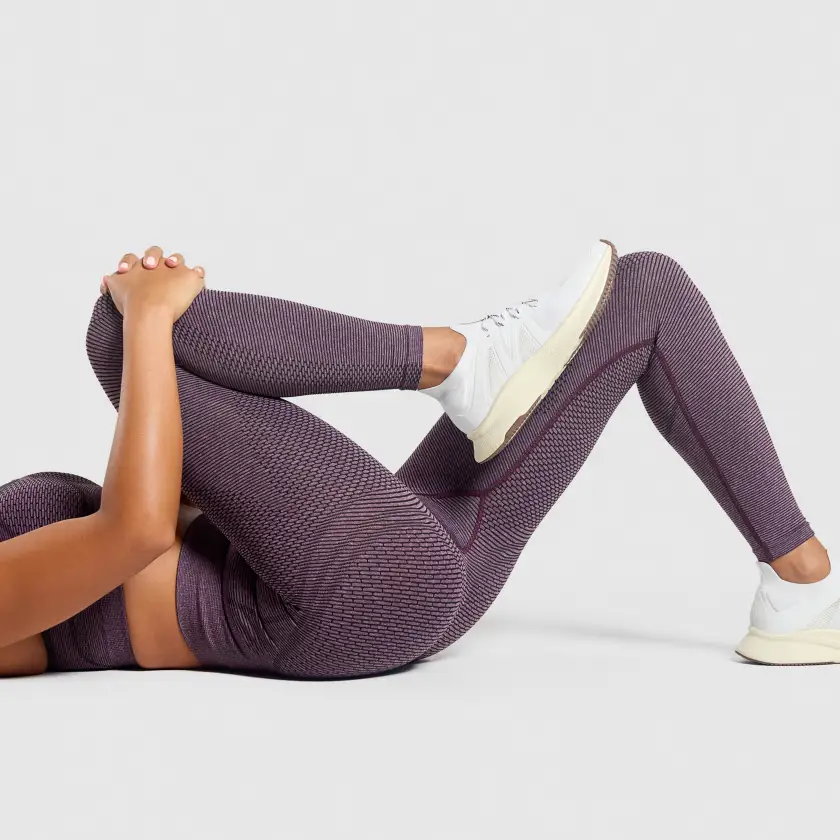 Same compression leggings fitting session showing lunge position for hip & thigh review