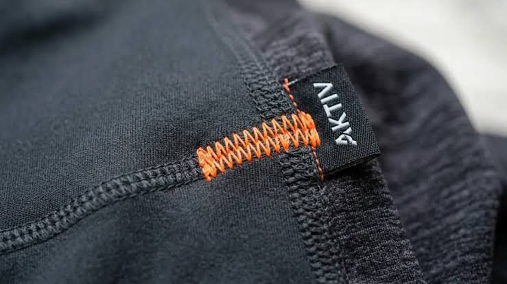 Precision computer bartack reinforcement stitch on pocket corner of workout shorts