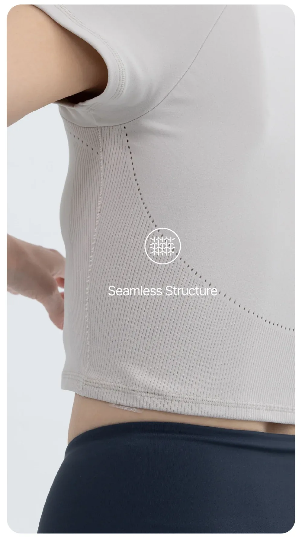 Seamless performance T-shirt showing engineered knitted texture and finished garment structure
