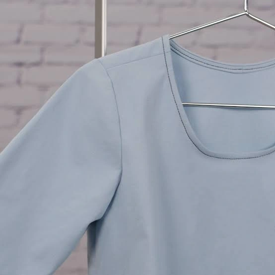 Gym top neckline finish showing collar band or binding construction