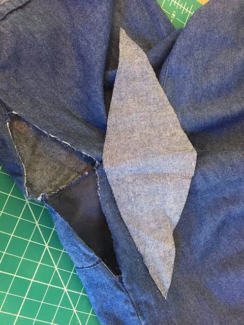 Underarm joining detail on a knitted activewear T-shirt