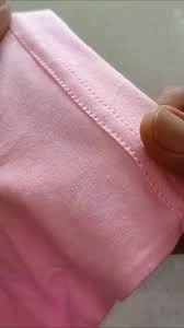 Sleeve opening and cuff finish of a seamless athletic top