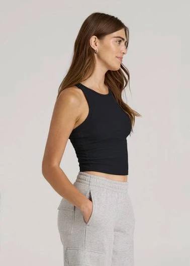 Cropped seamless tank with a short body length, fitted knit and finished hem