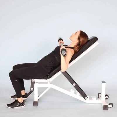 Strength training top in a bench pressing position showing shoulder and upper-back contact areas