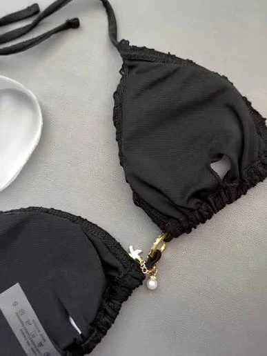 Interior of a built-in bra yoga tank showing lining and inner-layer attachment seams
