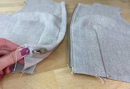 Half zip placket side construction showing real zipper tape seam allowance stitching and finished fabric
